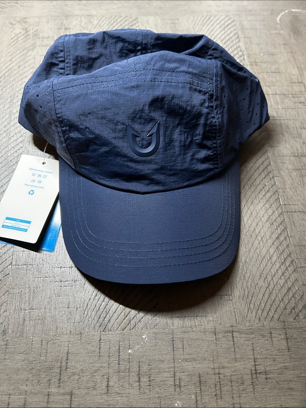 Men's Navy Performance Hat with Subtle Chevron Emblem